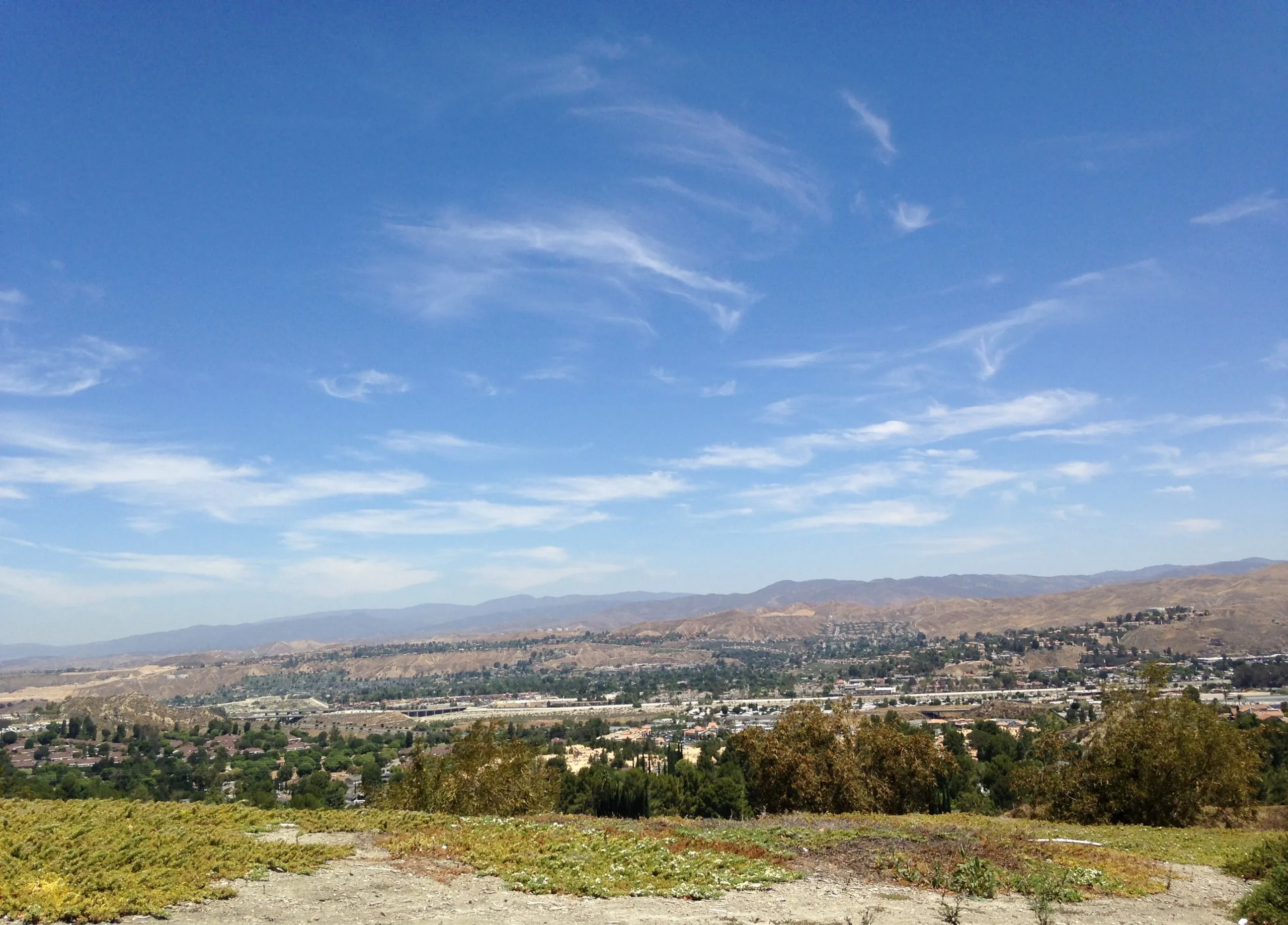 The Santa Clarita Valley seen from the hills, with the mountains beyond